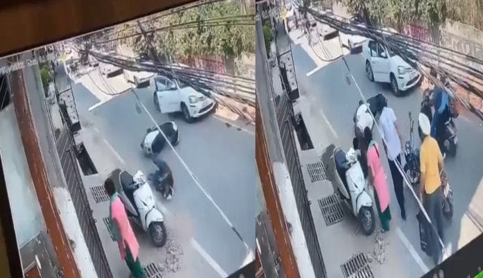 The car driver suddenly opened the gate, the scooty rider died after colliding, the video went viral The car driver suddenly opened the gate, the scooty rider died after colliding, the video went viral